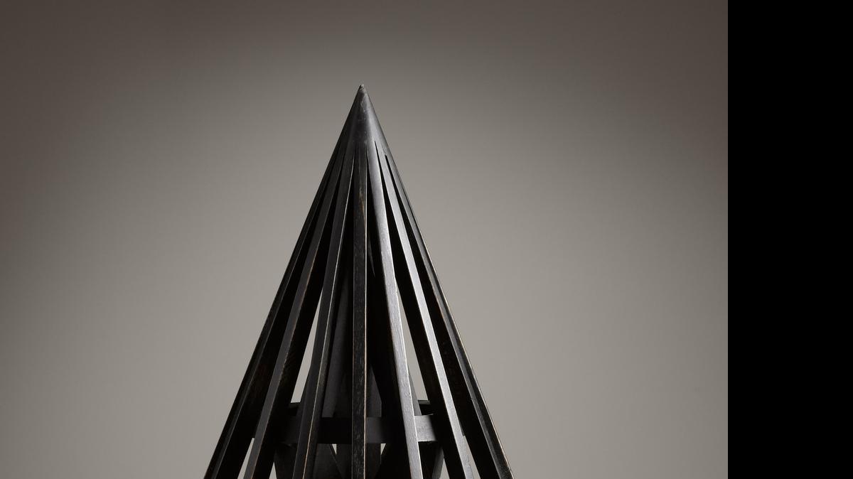 
This publicity photo released by Restoration Hardware shows a black Belgian wooden maquette, a scaled replicas of a model used by an architect to study form, structure and proportion. 
