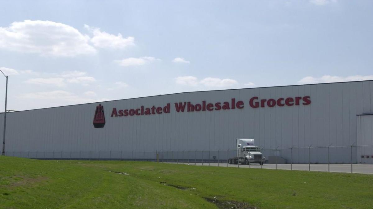 Associated Wholesale Grocers, which operates this Kansas City, Kan., warehouse, plans to combine distribution operations with Affiliated Foods Midwest.