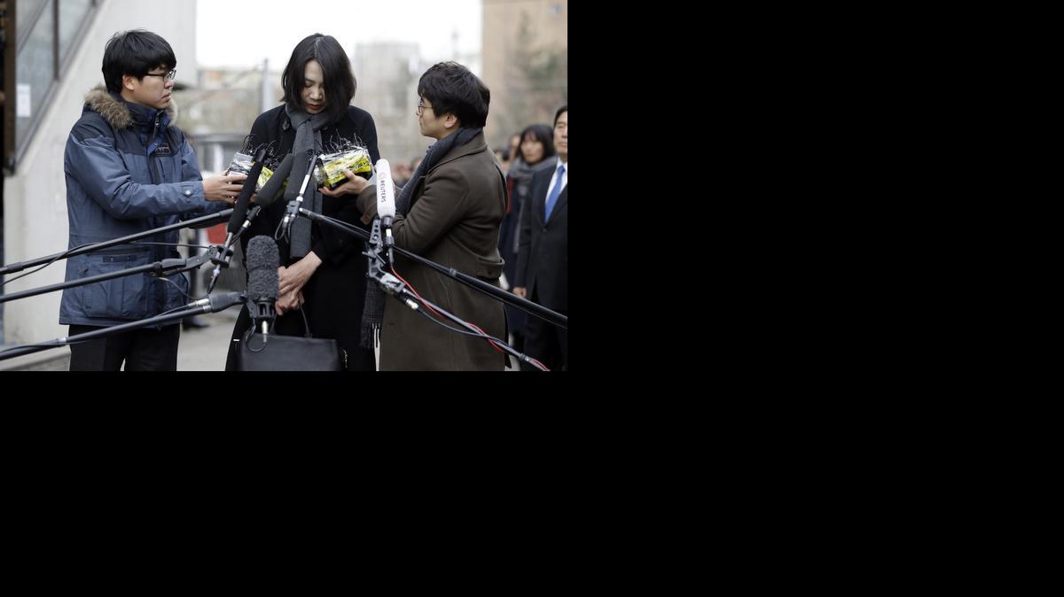 
Cho Hyun-ah, who was head of cabin service at Korean Air and the oldest child of Korean Air chairman Cho Yang-ho, speaks to the media upon her arrival for questioning at the Aviation and Railway Accident Investigation Board office of Ministry of Land, Infrastructure and Transport in Seoul, South Korea.
