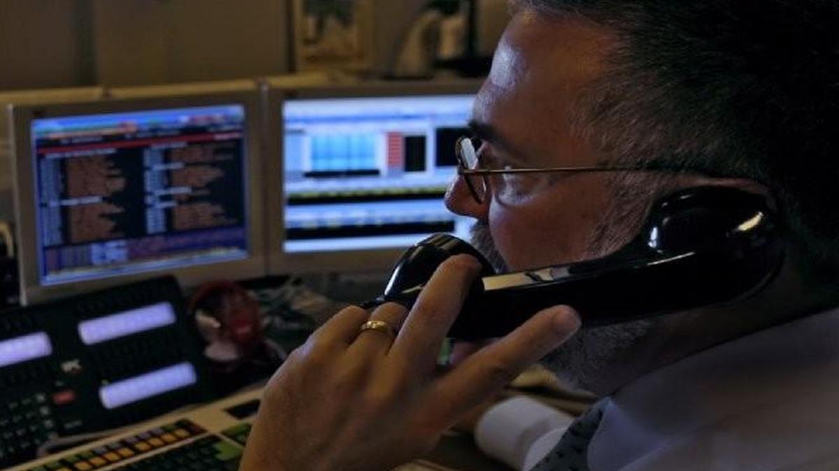 
Investment outflows cut into revenues and earnings at Waddell and Reed Financial in the second quarter. The view here is of the firm’s trading desk. 
