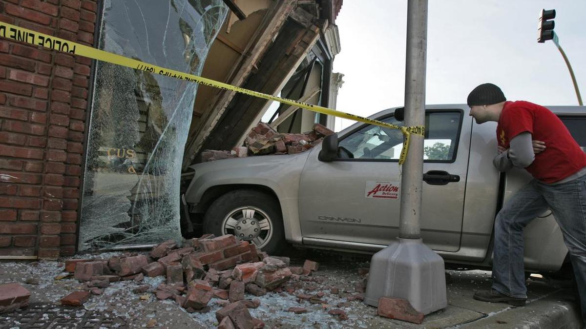Many stores around the country have been struck by vehicles, including The Frame Gallery in Kansas City in 2005 (pictured). In one recent Massachusetts case, the family of a woman killed in one such incident was awarded $32.4 million after it sued the store for not installing bollards, saftey barriers common in some retail lots.