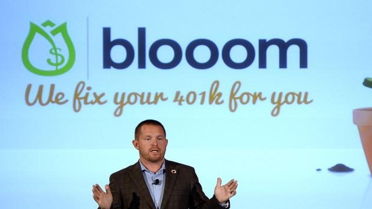 Blooom CEO and co-founder Chris Costello answered questions about the online investment advising startup during the One in a Million competition at the Kauffman Foundation in November.