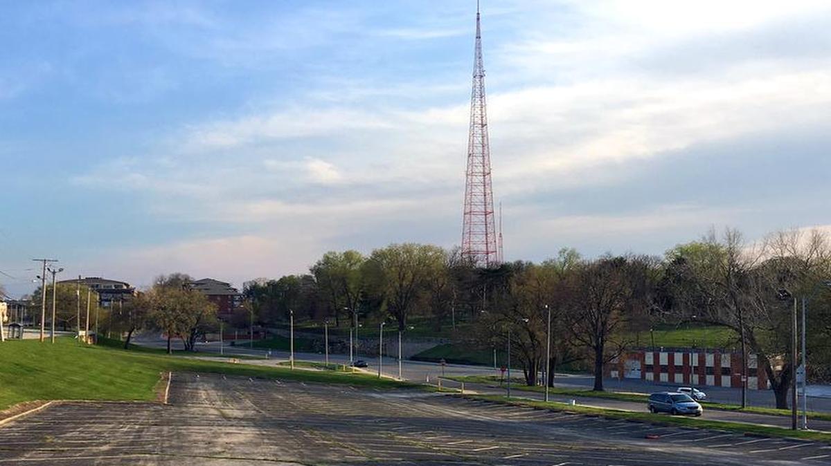 This view — looking southwest from 27th Street just west of Gillham Road — shows part of the redevelopment area. The area with trees to the right is the Union Cemetery border.