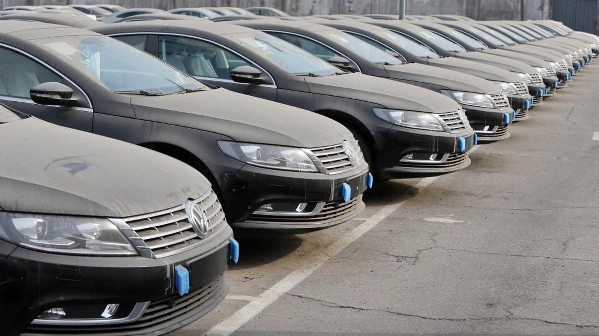 Volkswagen automobiles await distribution to dealers.