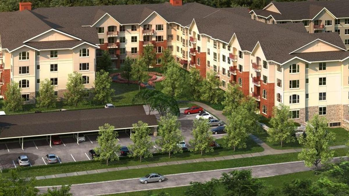A rendering of the Hummingbird Square apartment building under construction at Tallgrass Creek in Overland Park.