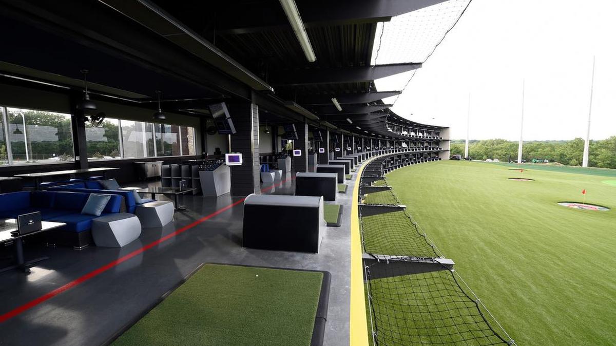 
Patrons attending the Topgolf Overland Park Media Taste & Tour Wednesday evening enjoyed a variety of amenities, horderves and cocktails. The first Topgolf location to open in Kansas, it features this 102-tee driving and chipping range.
