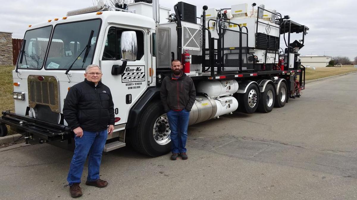Jim Gould (left), and Rocky Gunter own Gun-Ko Traffic Control, which sets up traffic control for road construction projects.