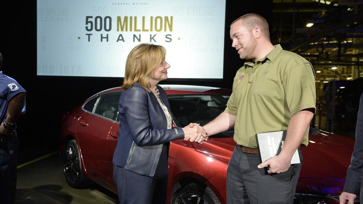 
General Motors chief executive Mary Barra shook hands with Trent Brining, an Overland Park resident who was wounded in 2005 while serving in Baghdad. Brining was given a new Malibu during the event at the automake’s Fairfax plant Monday in Kansas City, Kan.

