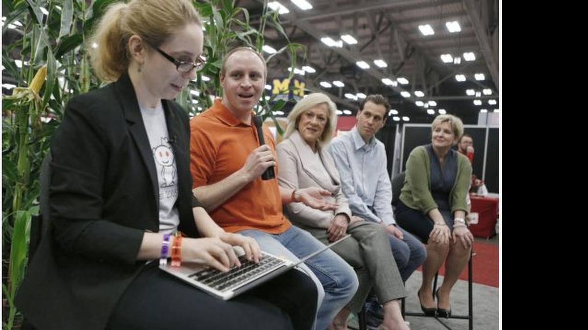 
Victoria Taylor, far left, moderates a live, in-person AskMeAnything session on GMOs at the GMO Answers exhibit at SXSW in March. Taylor's firing prompted a protest from the site’s moderators.
