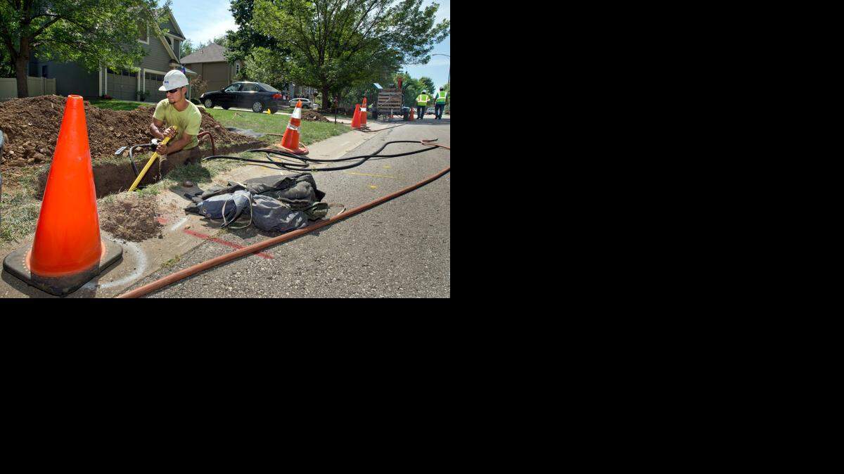 
Google has said that it won’t put Google Fiber in neighborhoods that do not show enough support, but some say that strategy seems to be changing. Google contractor Edbin Orellana worked Tuesday in Shawnee. 
