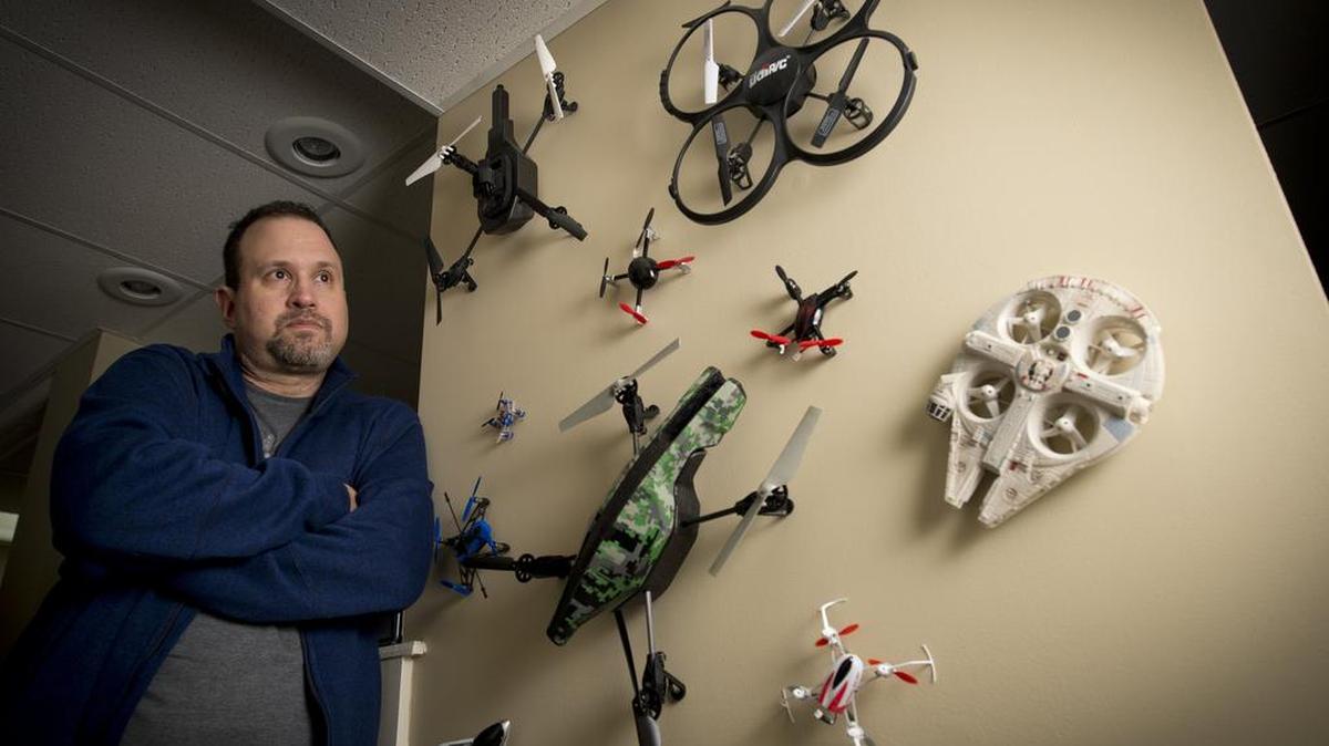 When his drones aren’t flying, Hal Gottfried keeps them hanging on a wall at his house.
