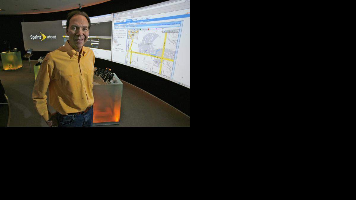 
Dan Hesse in 2008 displayed his company's technology showcase area on the Sprint campus.
