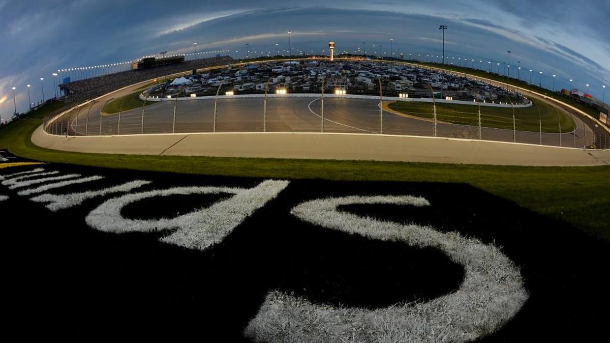 A drone carrying three smartphones will fly over the Kansas Speedway starting next month in an effort to improve wireless networks’ performance.