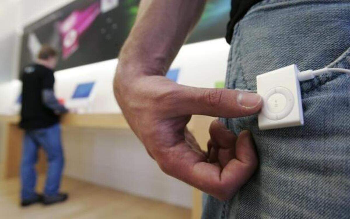 
A man wears an Apple iPod Shuffle at an Apple Store in Palo Alto, Calif.
