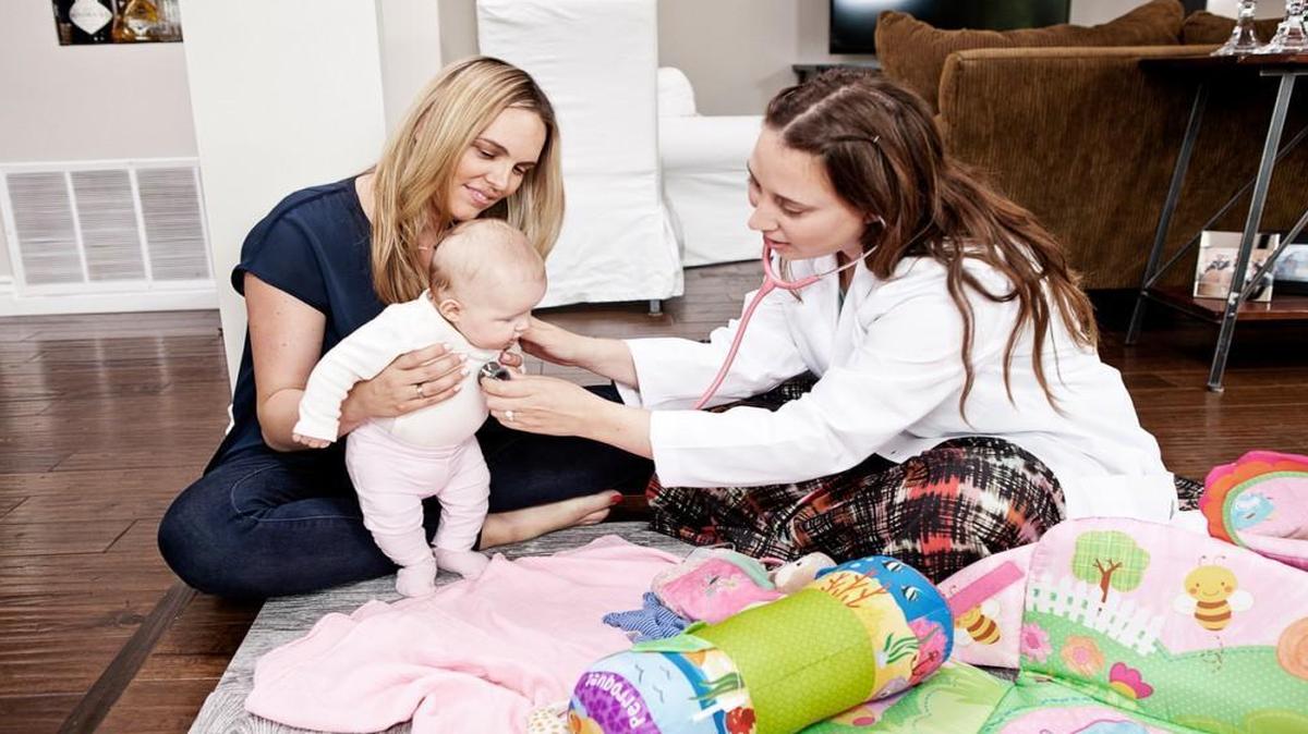
Jessica Orkin, a physician for Heal, made a house call to check on Nicky Drobnick’s baby, Charlotte. Heal started in Los Angeles and has added service in Orange County and San Francisco.
