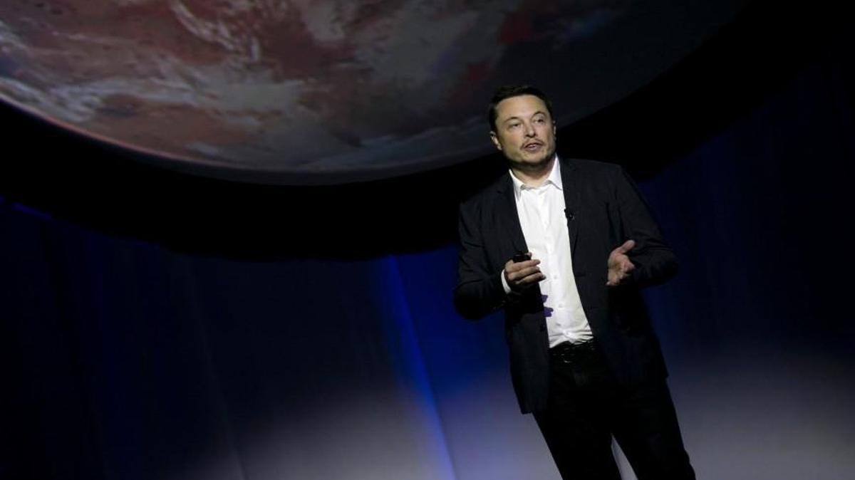 SpaceX founder Elon Musk speaks during the 67th International Astronautical Congress in Guadalajara, Mexico, Tuesday, Sept. 27, 2016. In a receptive audience full of space buffs, Musk said he envisions 1,000 passenger ships flying en masse to Mars, 'Battlestar Galactica' style. He calls it the Mars Colonial fleet, and he says it could become reality within a century.