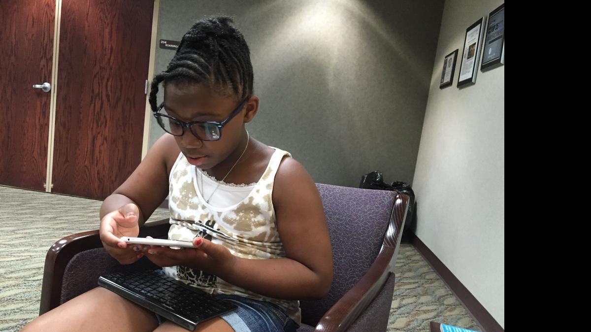 
At the Alphapointe Technology Camp, 12-year-old Amiah Washington from Knob Noster, Mo., has come up with ideas to make technology more accessible.
