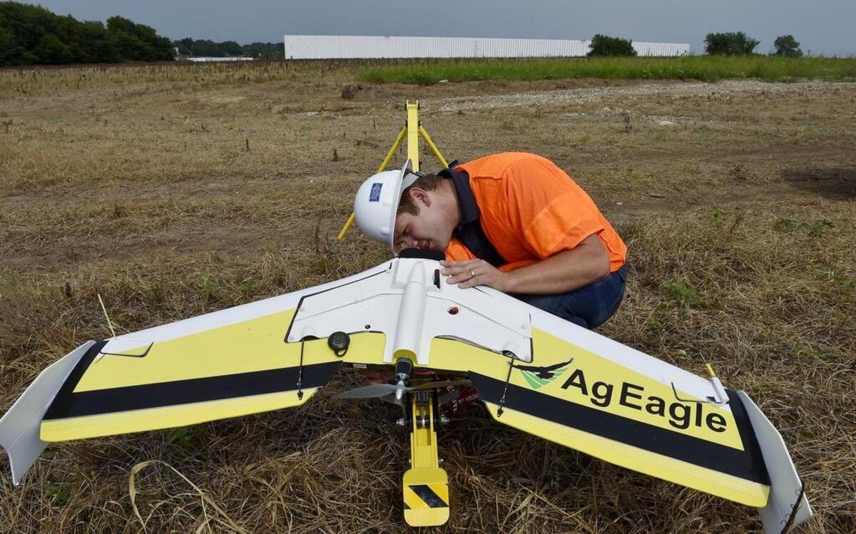 
Casey Adams, owner of the Kansas City Drone Co., prepared his aircraft for a test flight Tuesday afternoon in Grandview. Unmanned aerial systems are about to revolutionize agriculture by giving farmers eyes in the skies so they know exactly where their crops are doing well and where they are ailing — saving money, chemicals and water. They will lead to lower costs and higher yields.
