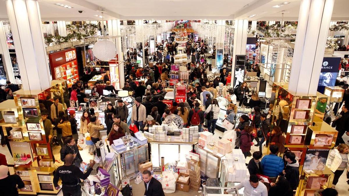 Shoppers crowded into Macy’s Herald Square in New York on Thursday to get a jump on deals.