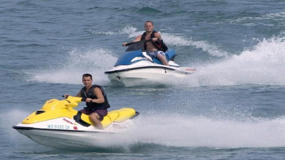
These riders of personal watercraft traveled on Lake Michigan off the Wisconsin coast in mid-August. 
