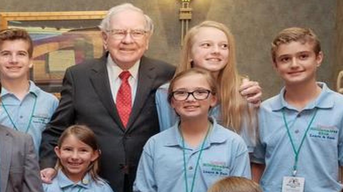 
Omaha investor Warren Buffett posed with the finalists in last weekend’s Grow Your Own Business Challenge. 
