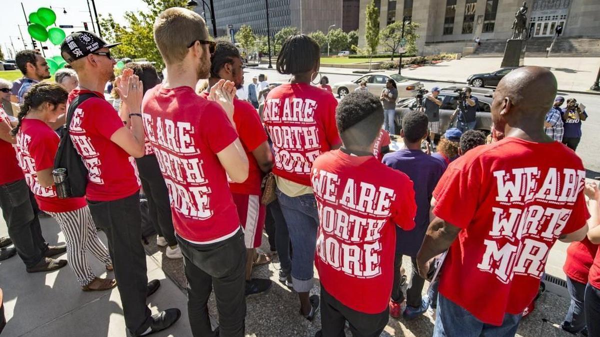 Organizers cheer at a rally held in Kansas City in 2017 to kick off a campaign to raise Missouri’s minimum wage.