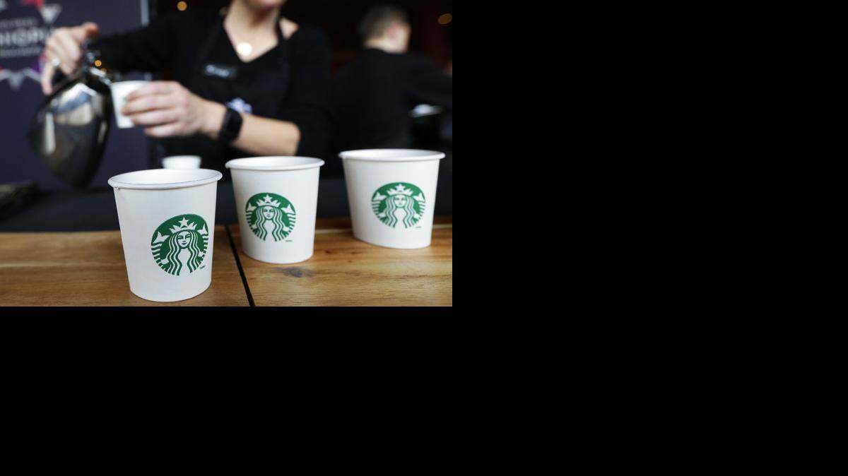 After reporting disappointing quarterly sales Thursday, Starbucks said it will offer a delivery option on its mobile app in select areas of the U.S starting next year.