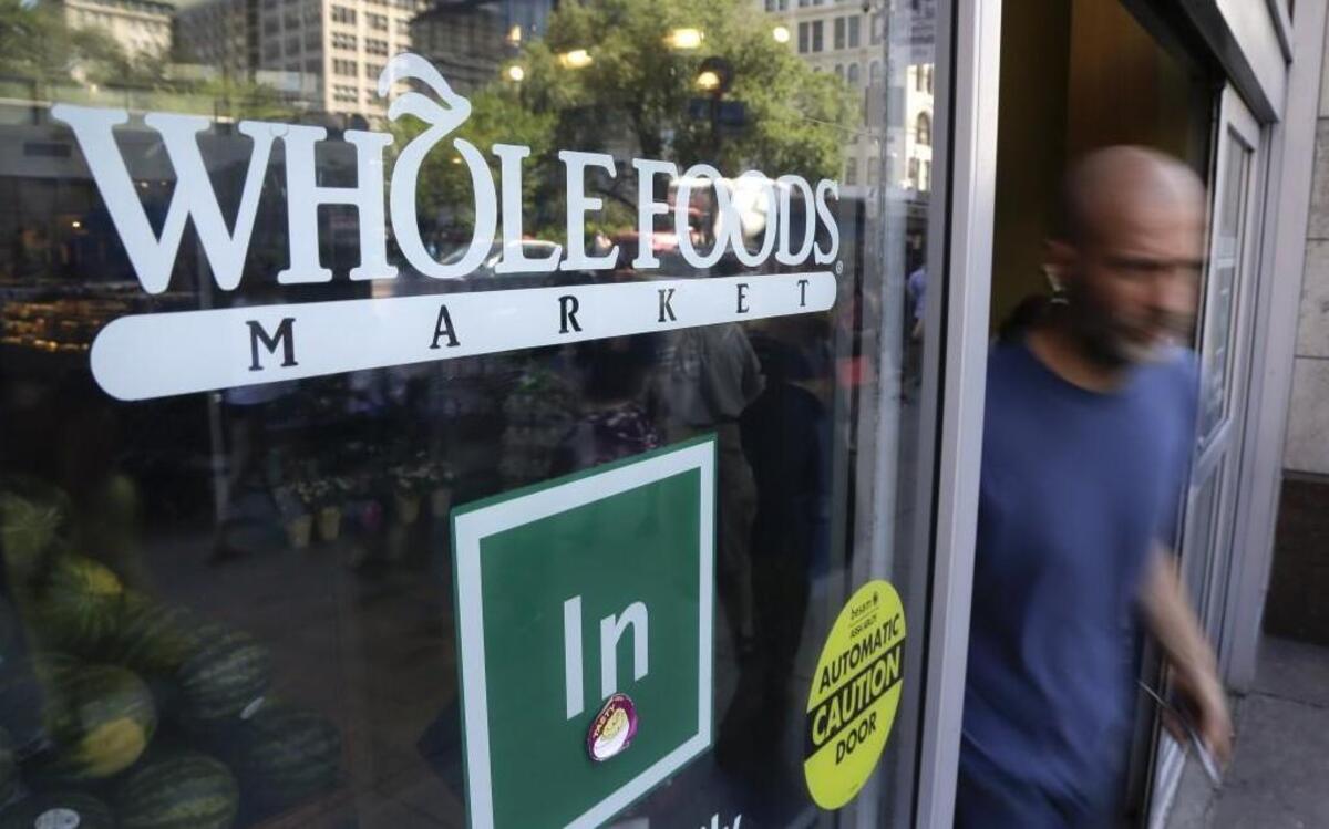 How could Amazon’s purchase of Whole Foods Market change the way Missourians and Kansans shop at grocery stores?