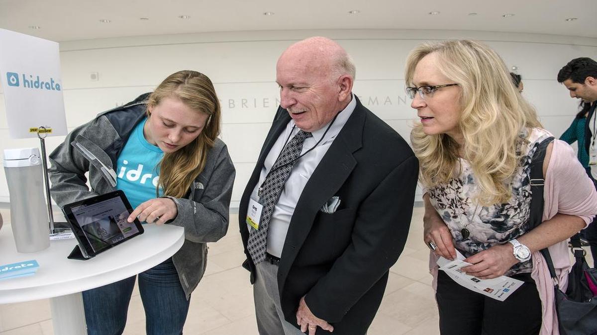 
Alexandra Reeken explained details about Hidrate, her “smarter” water bottle, to Greg Pabich, a businessman from Dallas, and Beverly Stewart with the Bloch School of Management at the University of Missouri-Kansas City.
