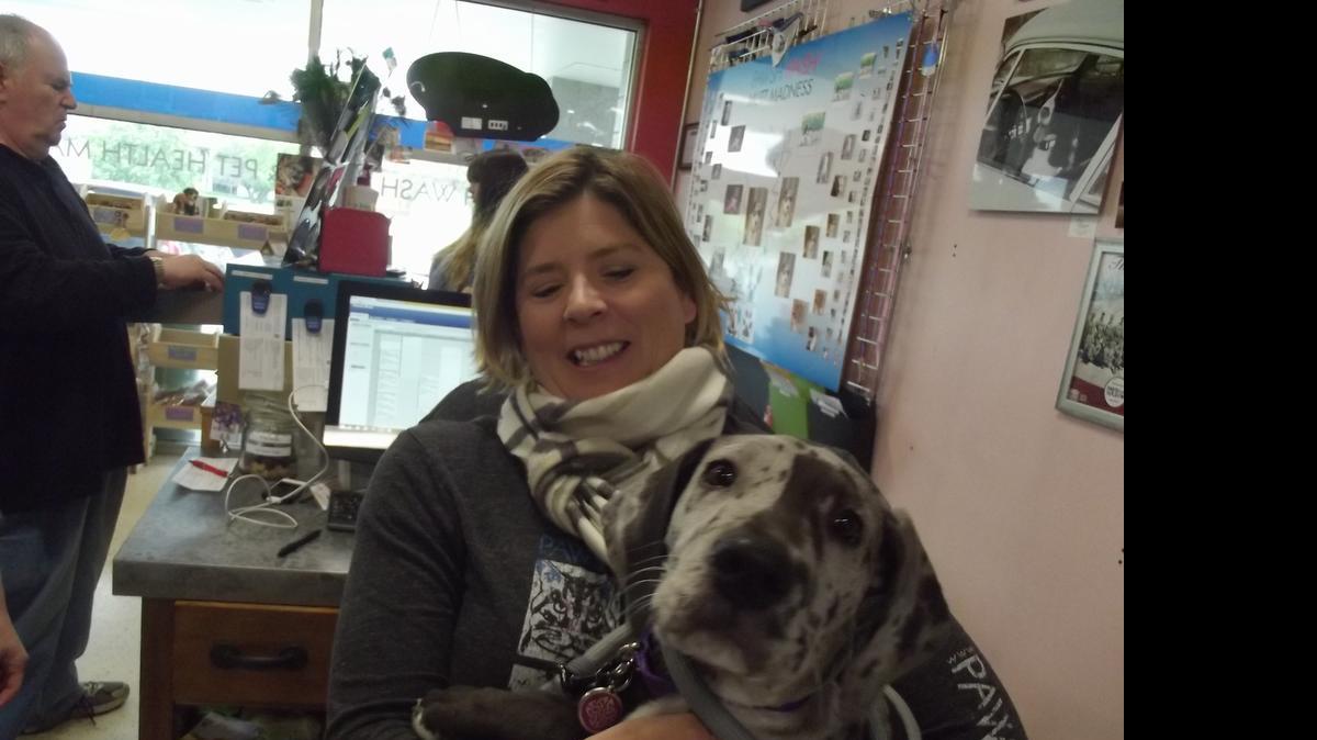 
At Pawsh Wash in Lawrence, a pet grooming and pet supply shop, co-owner Amber Nickel says pet food is a big source of revenue for her store.
