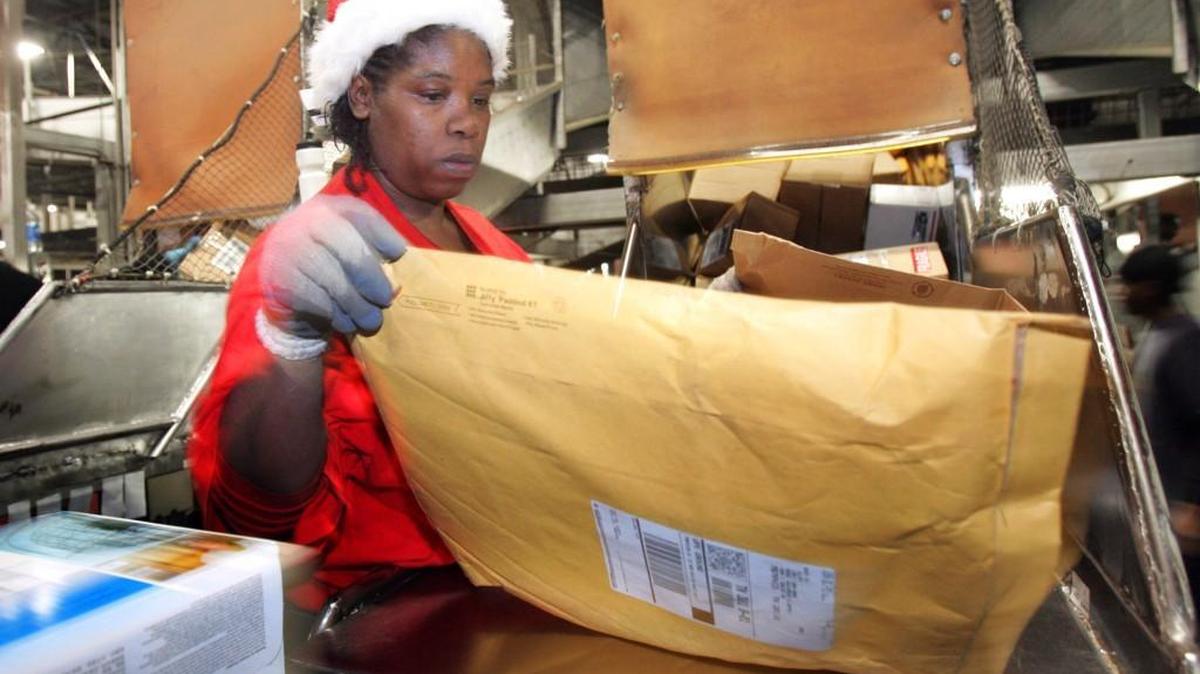 UPS says some package deliveries are being delayed because of an unexpected flood of orders from online shoppers.