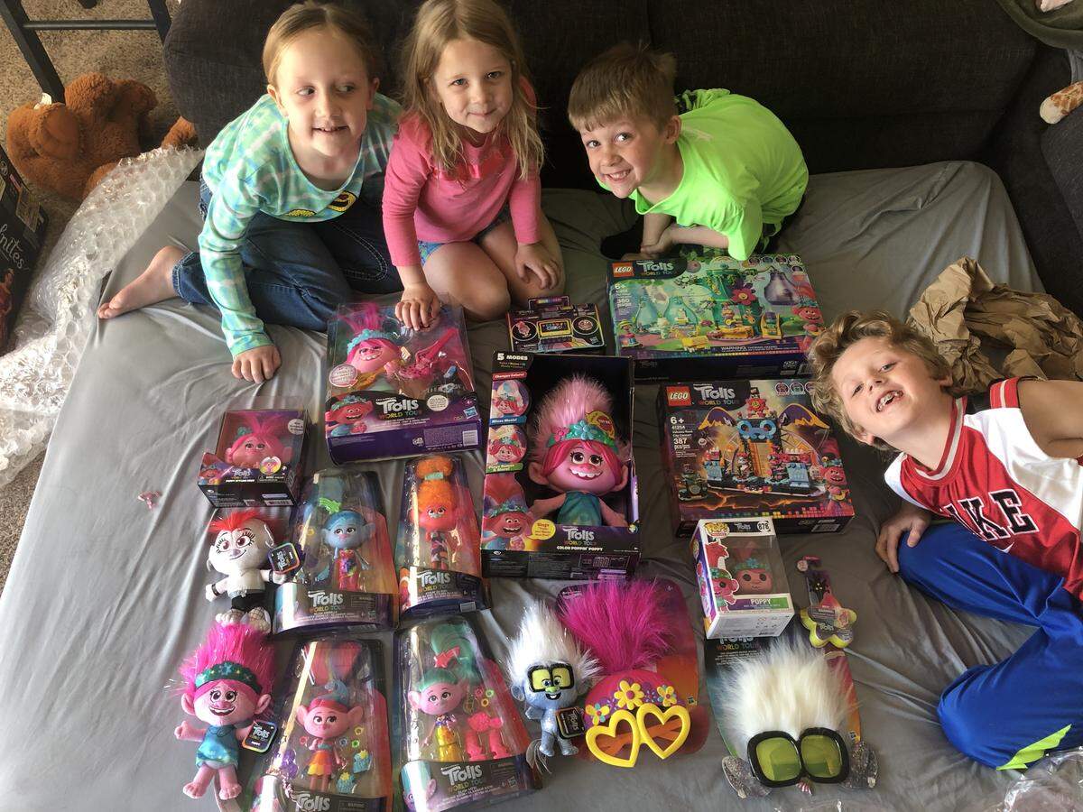 The Kelly children —&nbsp;Delaynie, 8, Camryn, 4, McClain, 6, and Sullivan, 10 —&nbsp;pose with a “Trolls” care package they received from NBC’s Today Show. The Gardner, Kansas family was featured on the program Friday morning, as they spoke on a video call with “Trolls” stars Justin Timberlake and Anna Kendrick. The four children’s mother, Stacie, is a nurse practitioner who volunteered to fly to New York to assist others during the COVID-19 pandemic.