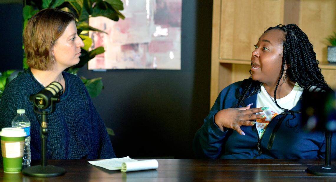 Keshia Shannon, right, owner of Fire and Ice Athletic, talks with Kansas City Star journalist Allison Dikanovic, about her business in the studios of KC Gift.