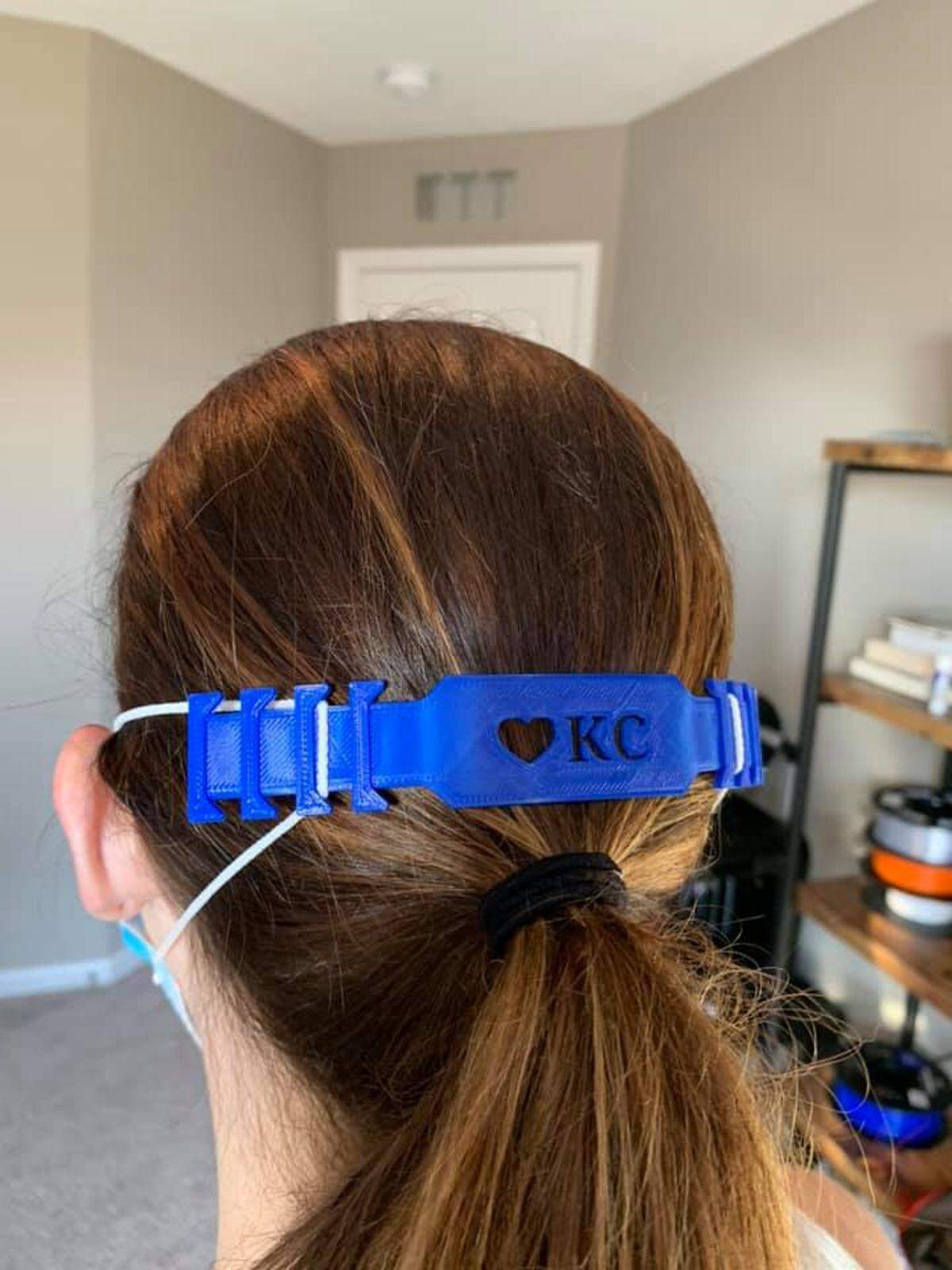 Seven-year-old Ethan Stimac, of Lenexa, has created KC-themed mask bands that assist with keeping masks in place and also alleviating pressure from the backs of the ears.
