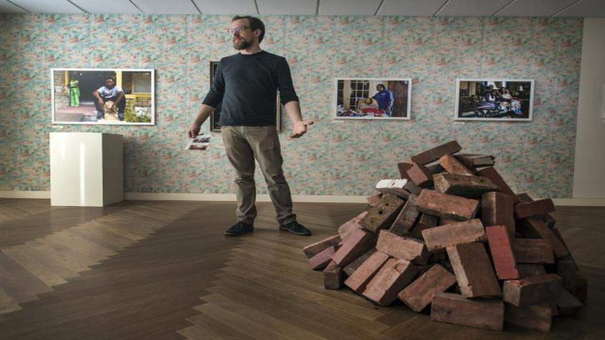 
Matt Rahner’s art installation at the downtown Kansas City Public Library focuses on the process of eminent domain. It includes bricks from a demolished house and photos of residents from the Wendell Phillips neighborhood.

 
