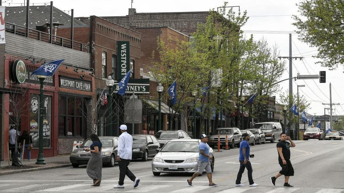 The busy corner of Westport Road and Broadway, looking west toward Pennsylvania Avenue, is the image that Kansas Citians have of the midtown entertainment district. The future proposed changes to the area will face neighborhood opposition to more density, traffic and parking problems.