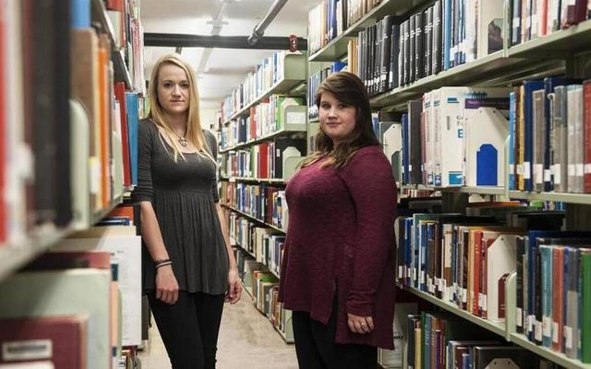 Sara Weckhorst (left) and Tessa Farmer are two of the three women now suing Kansas State University claiming it failed to investigate their accusations they were raped by another student.