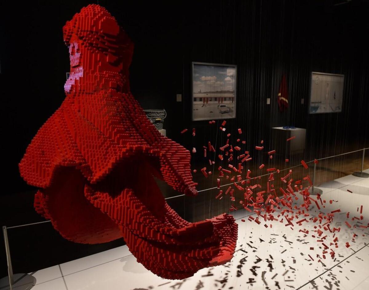 “The Red Dress” is part of an exhibition called “The Art of the Brick,” which opens Friday at Union Station. The show features sculptures made exclusively of Lego pieces by artist Nathan Sawaya. The show runs through May.