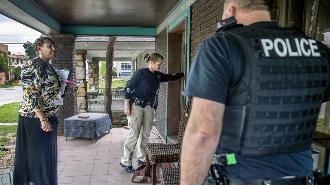 The National Alliance on Mental Illness of Greater Kansas City has been a “true friend” of police Crisis Intervention Teams, Kansas City Police Sgt. Sean Hess said Monday. In this file photo, police officer and CIT squad member Ashley McCunniff knocks on a door in Kansas City near her partner Aric Anderson (back to camera), and Cheryl Reed, a community mental health liaison.