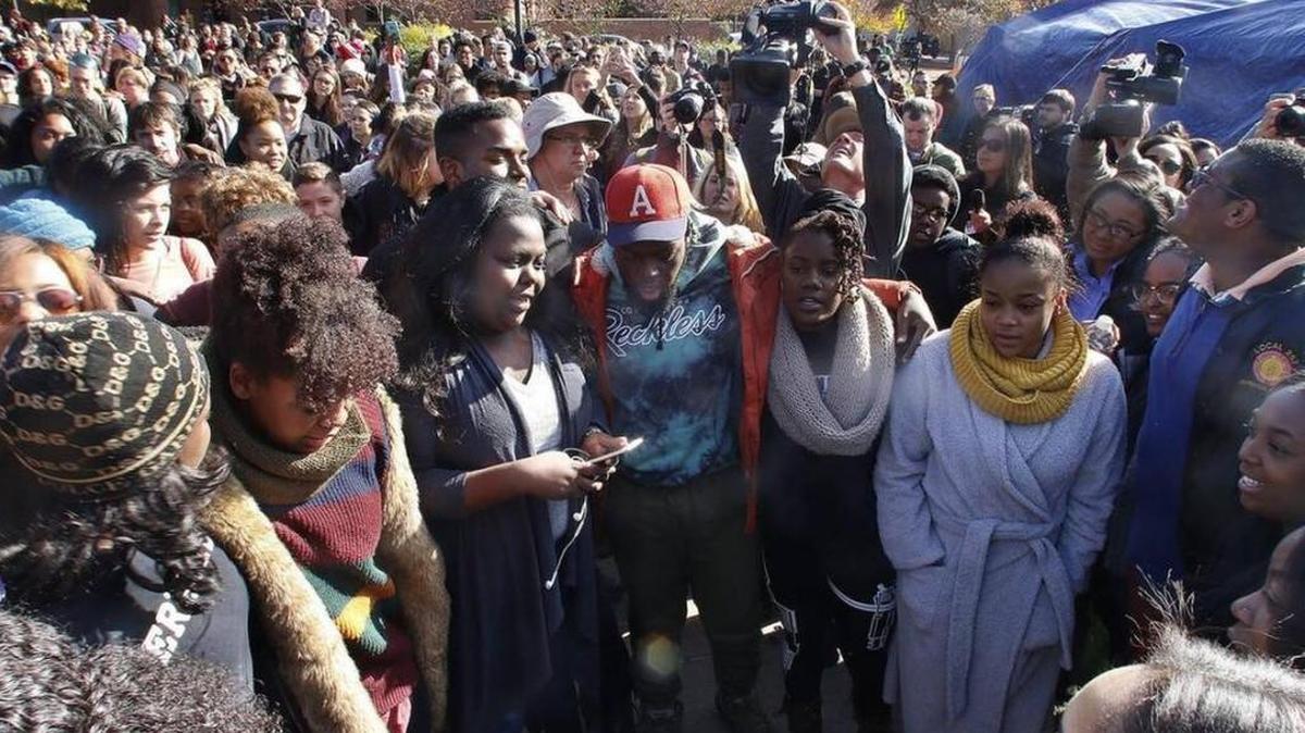 Supporters gather after the announcement that University of Missouri System President Tim Wolfe would resign, in Columbia, Mo., over mounting pressure from campus groups regarding his handling of racial tensions at the school on Nov. 9, 2015. Two days later, Russian Twitter trolls would use Twitter to stoke fears that the KKK were patrolling campus, a new report says.