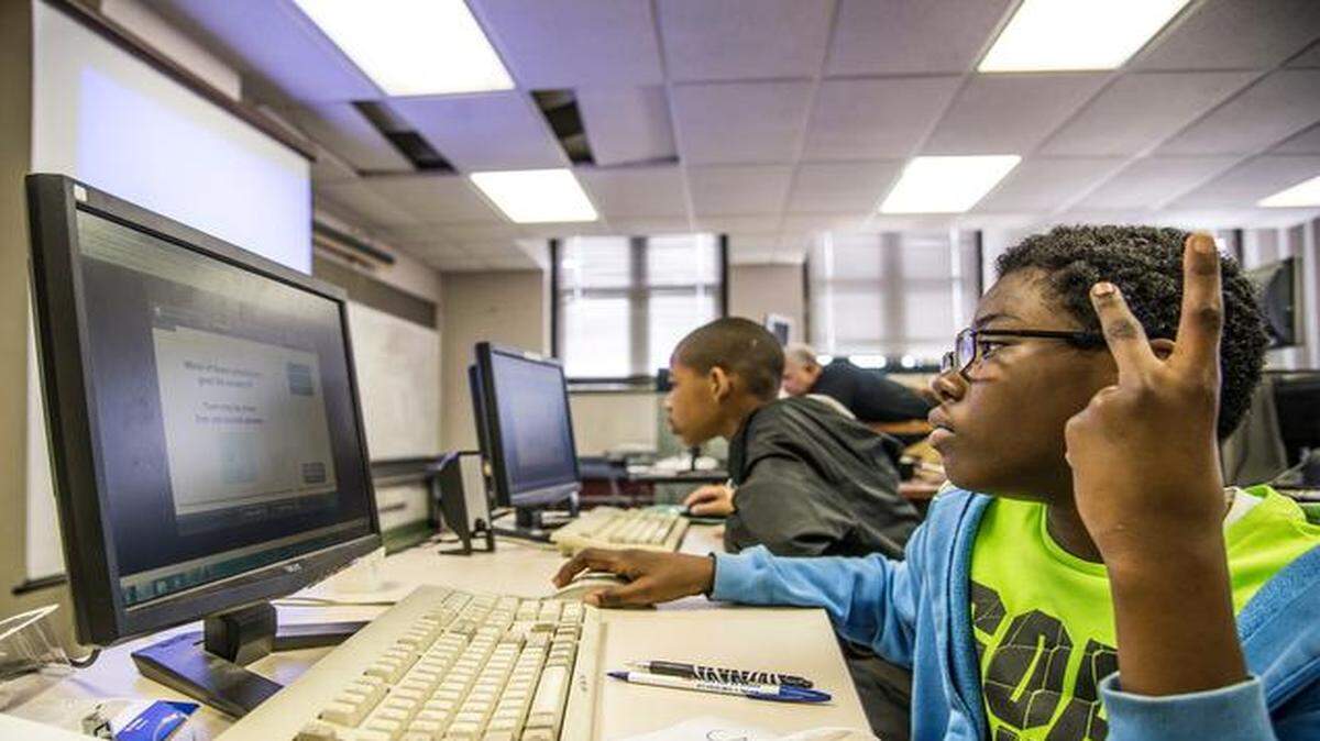 
Sixth-grader Robert Bond worked through problems during a math challenge at the Kansas City Computer Olympics on Saturday at the W.E.B. DuBois Learning Center. This was the first year of the event.
