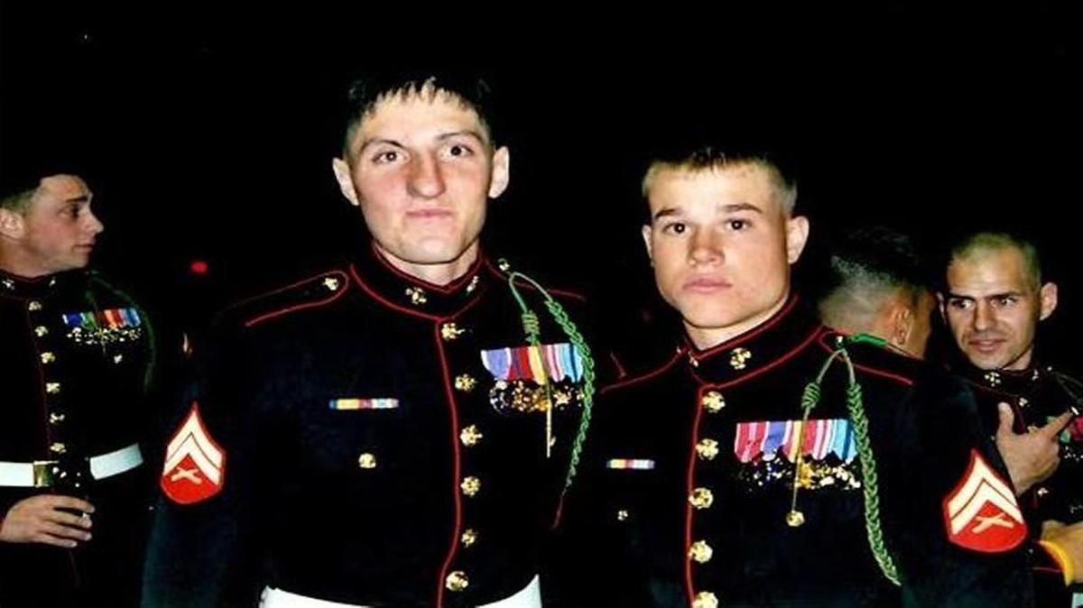 James Gentile (left) and friend Joe Hayes attended the U.S. Marine Ball in 2004. On Wednesday, Gentile has another major event to attend: America’s Parade, where he will march with Operation Mend. The program helped restore his sight after he was shot in Iraq.