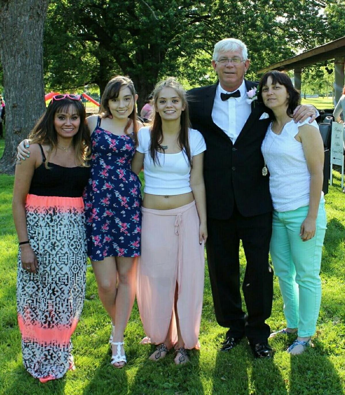 Gabi (second from left) stands between her sisters Jennifer (left) and Claire with her parents, Dave and Lana Keil.