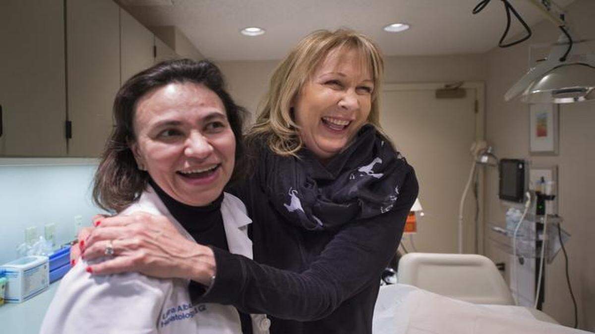 
Last month at St. Luke’s Medical Plaza, 60-year-old Sallie Wickens (right) learned that she is free of hepatitis C, which she apparently contracted from a transfusion when she was 5. She responded by hugging her doctor, Laura Alba.
