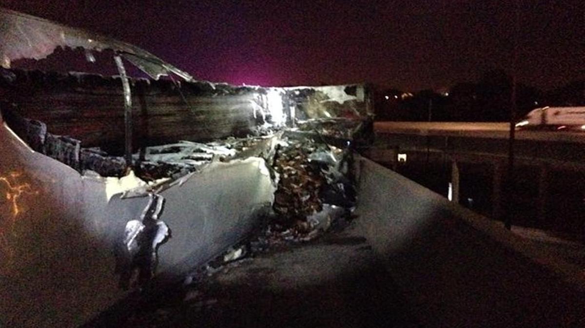 A tractor-trailer hauling smoked sausages overturned early Wednesday along Interstate 670 just after Seventh Street Trafficway.
