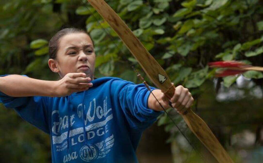 
Lucy Benjamin, 11, of Jefferson City sent an arrow flying as she tried her hand at archery Sunday at the fall festival at the Shawnee Indian Mission historic site in Fairway.
