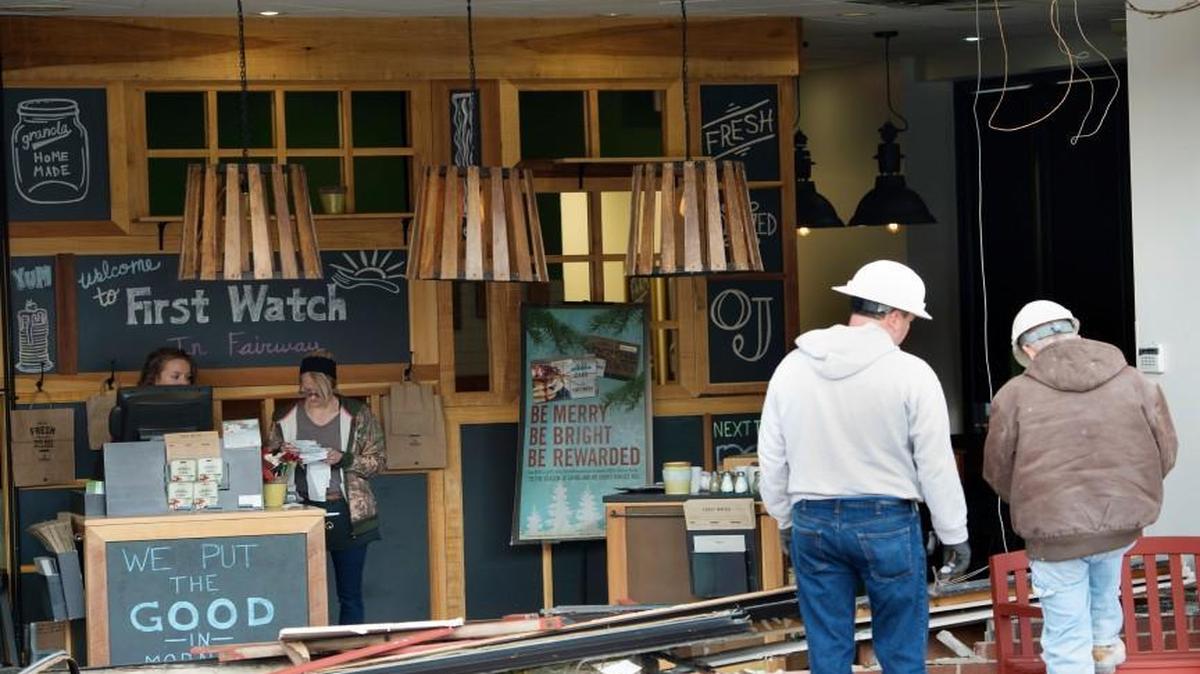 A construction crew was on site, as were staff members of First Watch restaurant in Fairway after a vehicle went through the wall Friday at the restaurant.