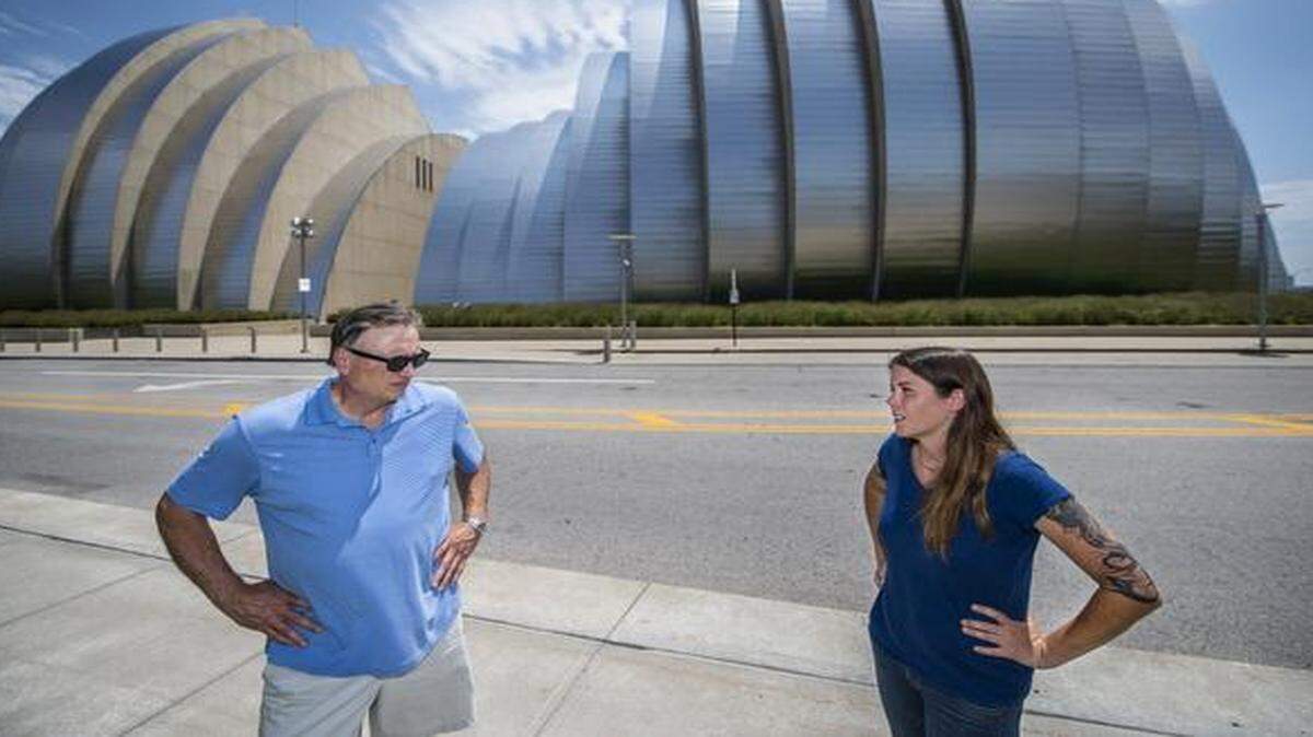 
Robin Richerson, a bronze sculptor from Lenexa, and Christie Goodman discussed a possible location for a memorial bench for her husband, Ryan Goodman, who died during construction of the Kauffman Center for the Performing Arts. 
