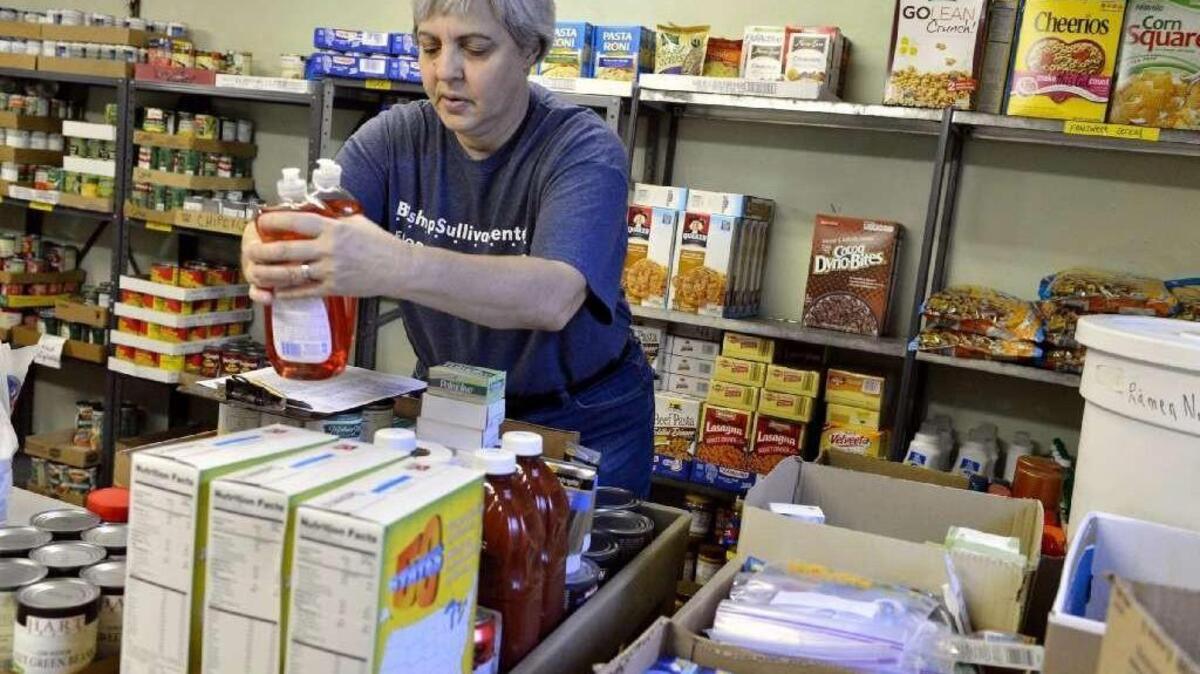 Colleen Simon directed the food pantry at St. Francis Xavier before losing that job in 2014.