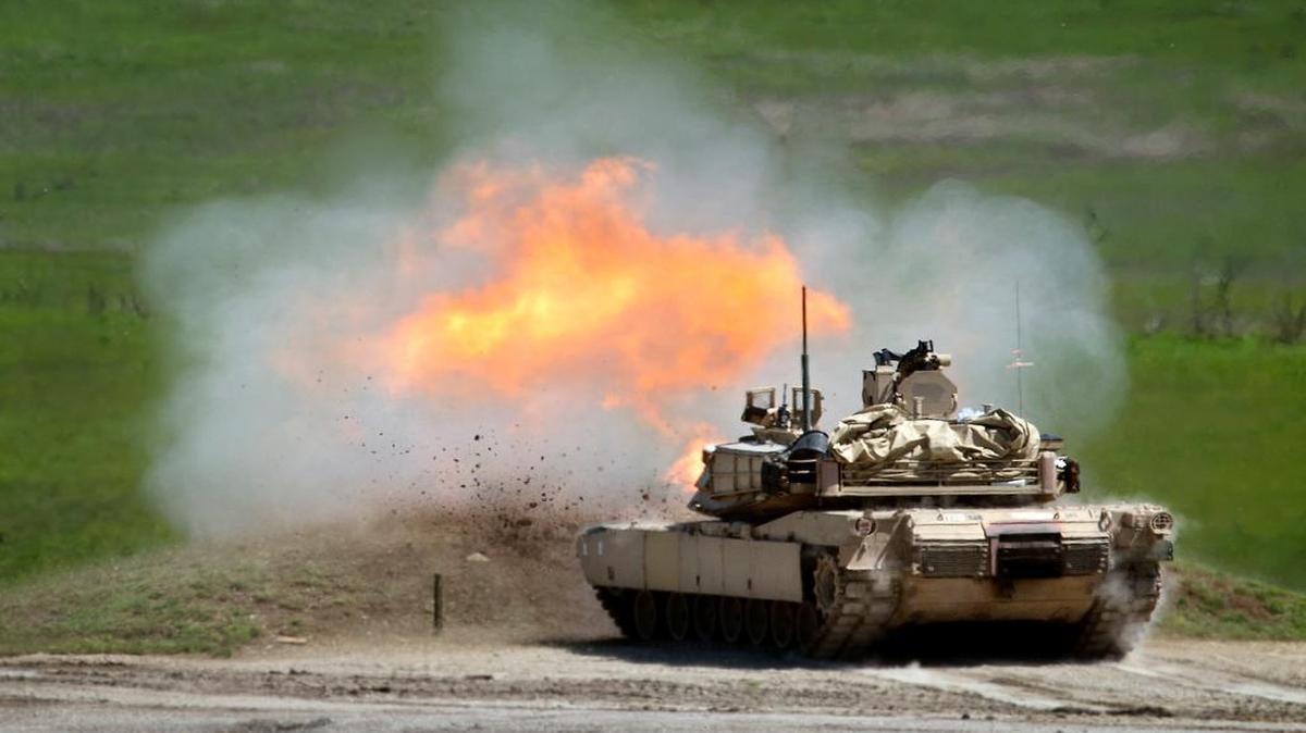 
Soldiers at Fort Riley, Kan., got reacquainted with battle plans featuring M1 Abrams tanks not common in Iraq or Afghanistan. Troops fired at a target in an exercise Thursday.

